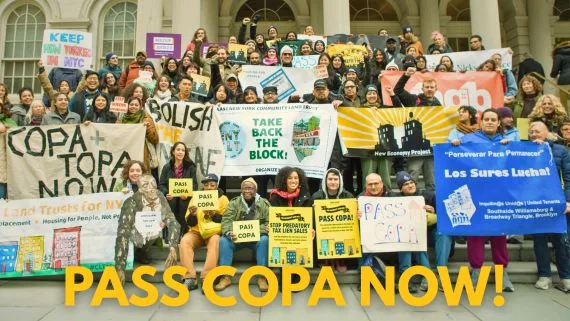 PASS COPA NOW! in front a picture of a group rallying on the steps of a government building