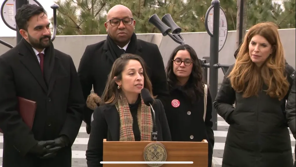 Deyanira Del Rio joins Mayor Mamdani, Speaker Menin, and others at a press conference.
